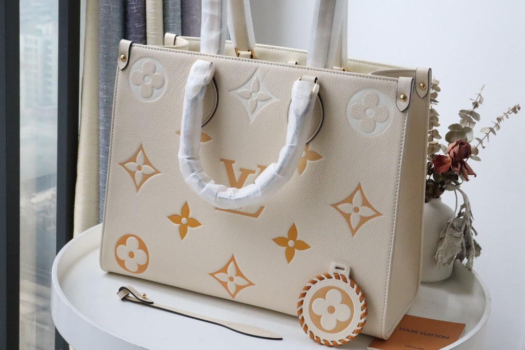 LV OnTheGo MM Tote Bag Monogram Empreinte Cream For The Pool Collection, WoHandbags 13.8in/35cm LV M45717