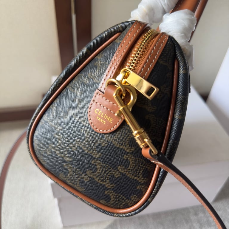 CE  SMALL BOSTON CUIR TRIOMPHE IN TRIOMPHE CANVAS AND CALFSKIN TAN