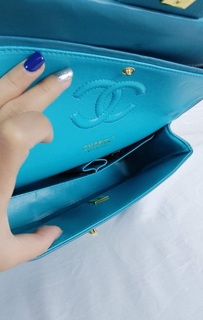 CHL CLASSIC MEDIUM LAMBSKIN FLAP DARK TURQUOISE CAVIAR AND GOLD 25CM