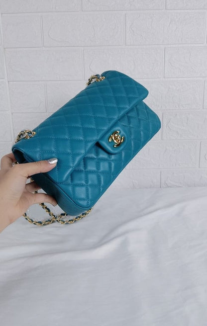 CHL CLASSIC MEDIUM LAMBSKIN FLAP DARK TURQUOISE CAVIAR AND GOLD 25CM